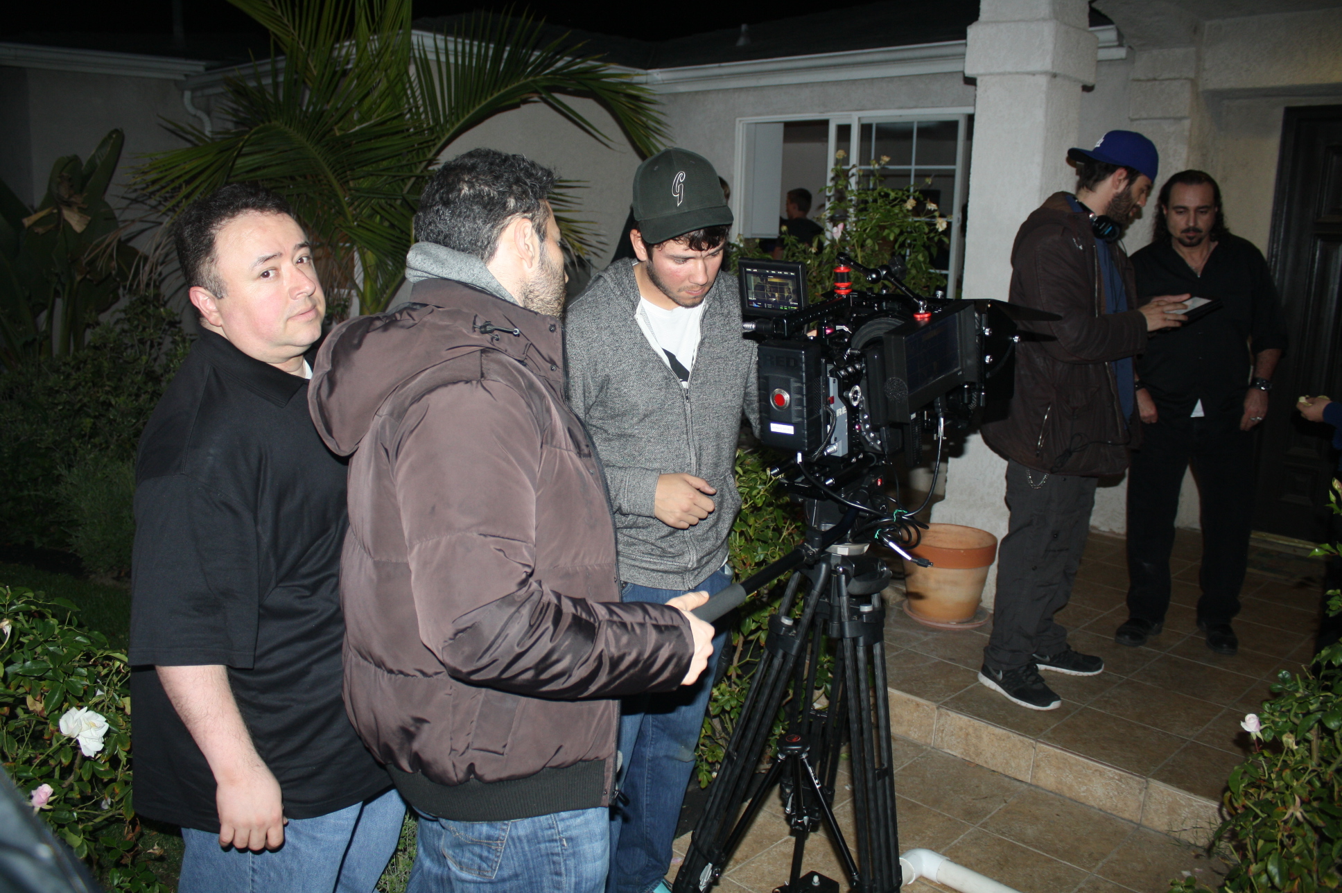 Sam Osman (far right) getting Scene Instructions from Director Jared Cohn on the Set of 