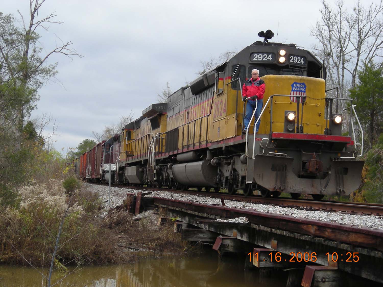 A lowland bayou in west Alabama provides a scenic foreground for an ex-D&RGW SD40-2 