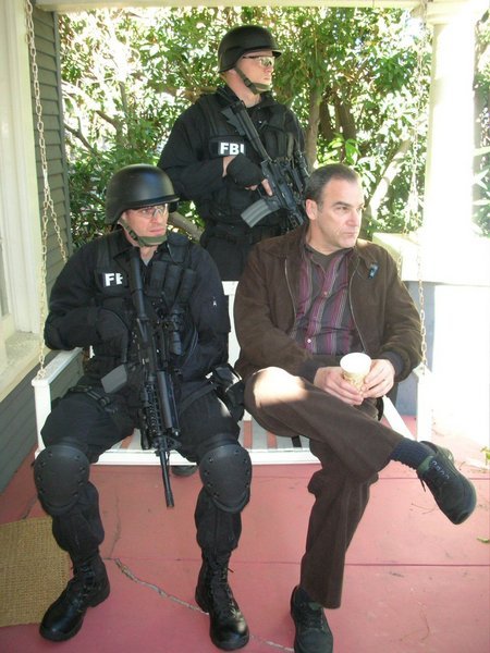 Dotan Baer and Skylar Adams provide a few levels of protection for Mandy Patinkin on Criminal Minds as part of FBI SWAT