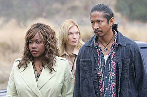 Production still from the set of THE UNIT, Season 2. With series regulars, Regina Taylor and Abby Brammell.