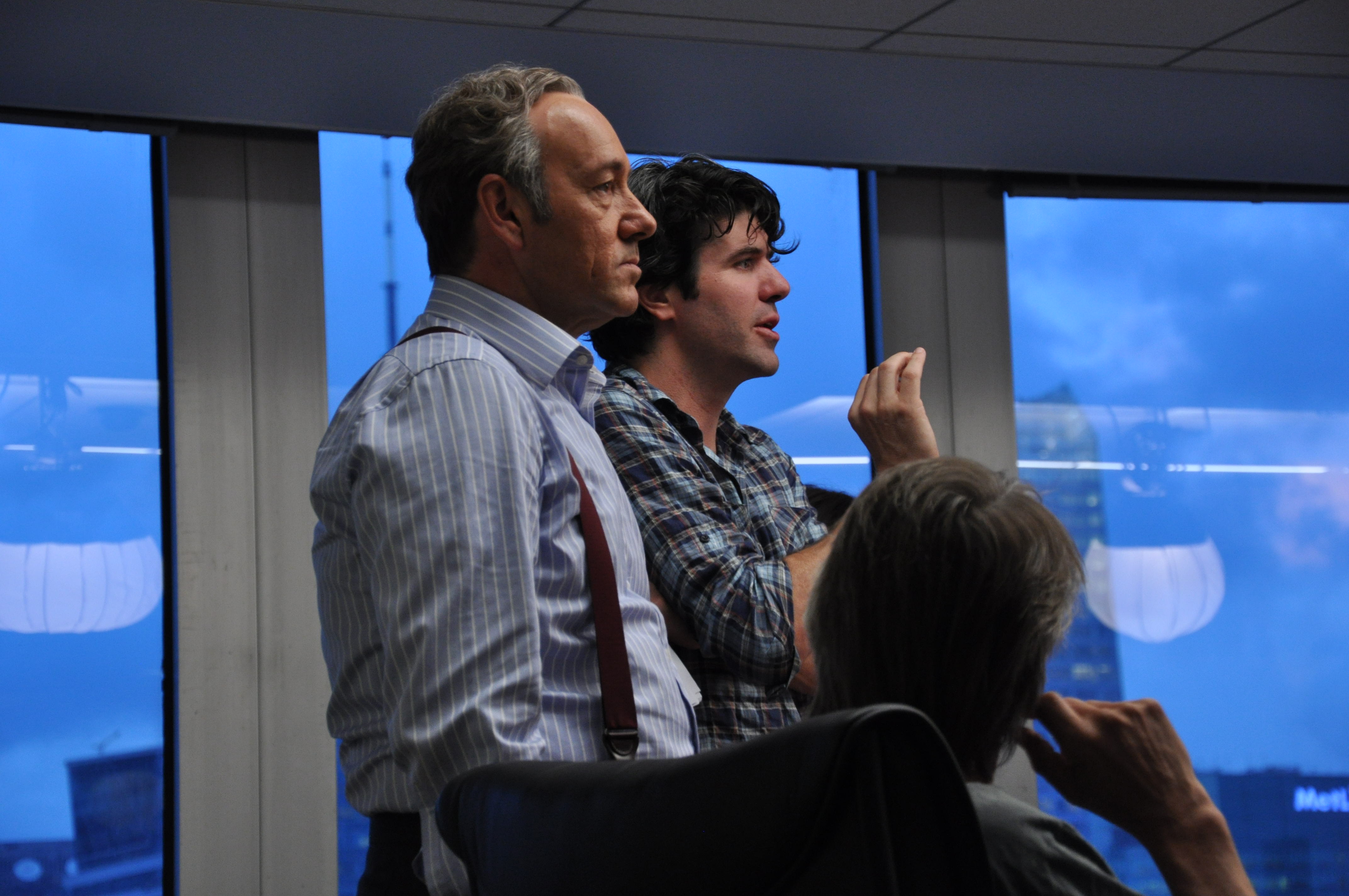 Writer/Director J.C. Chandor on the set of Margin Call with actors Kevin Spacey and Jeremy Irons