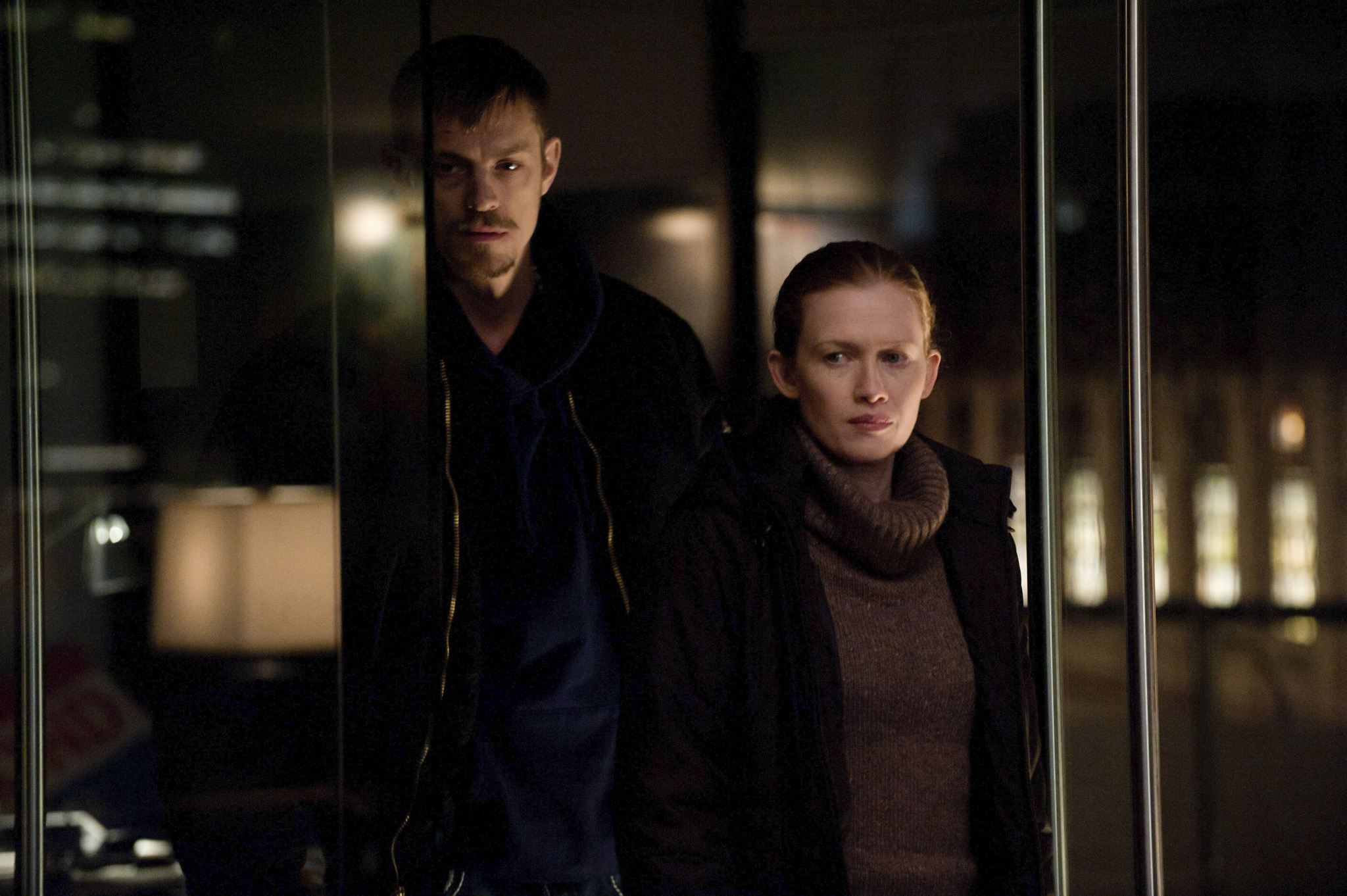 Mireille Enos, Joel Kinnaman and Stephen Holder in Zmogzudyste (2011)