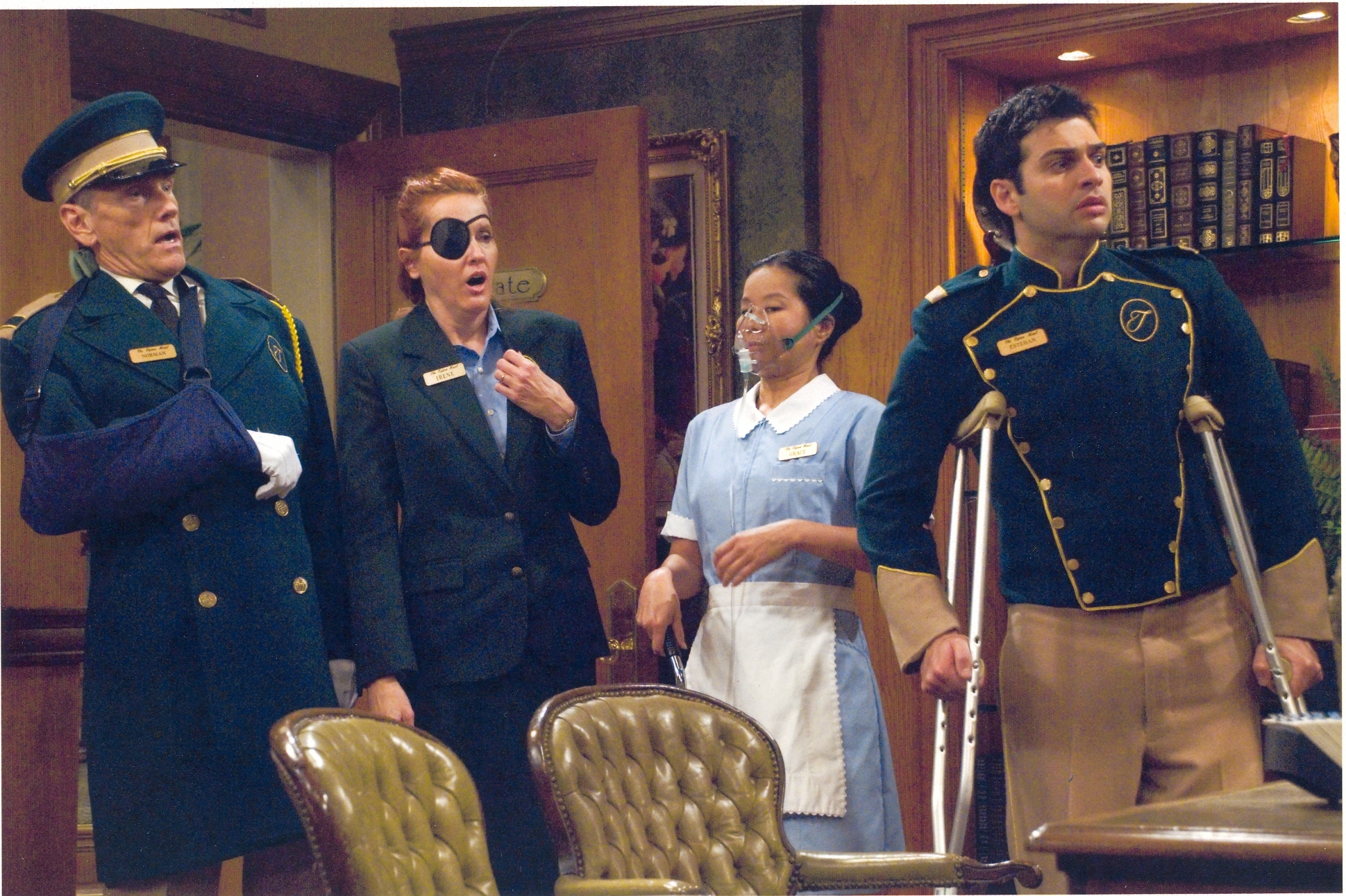 The Tipton Staff: Antony Acker (Norman the Doorman), Sharon Jordan (Irene the Concierge), Naomi Chan (Grace the Maid) and Adrian R'Mante (Esteban).
