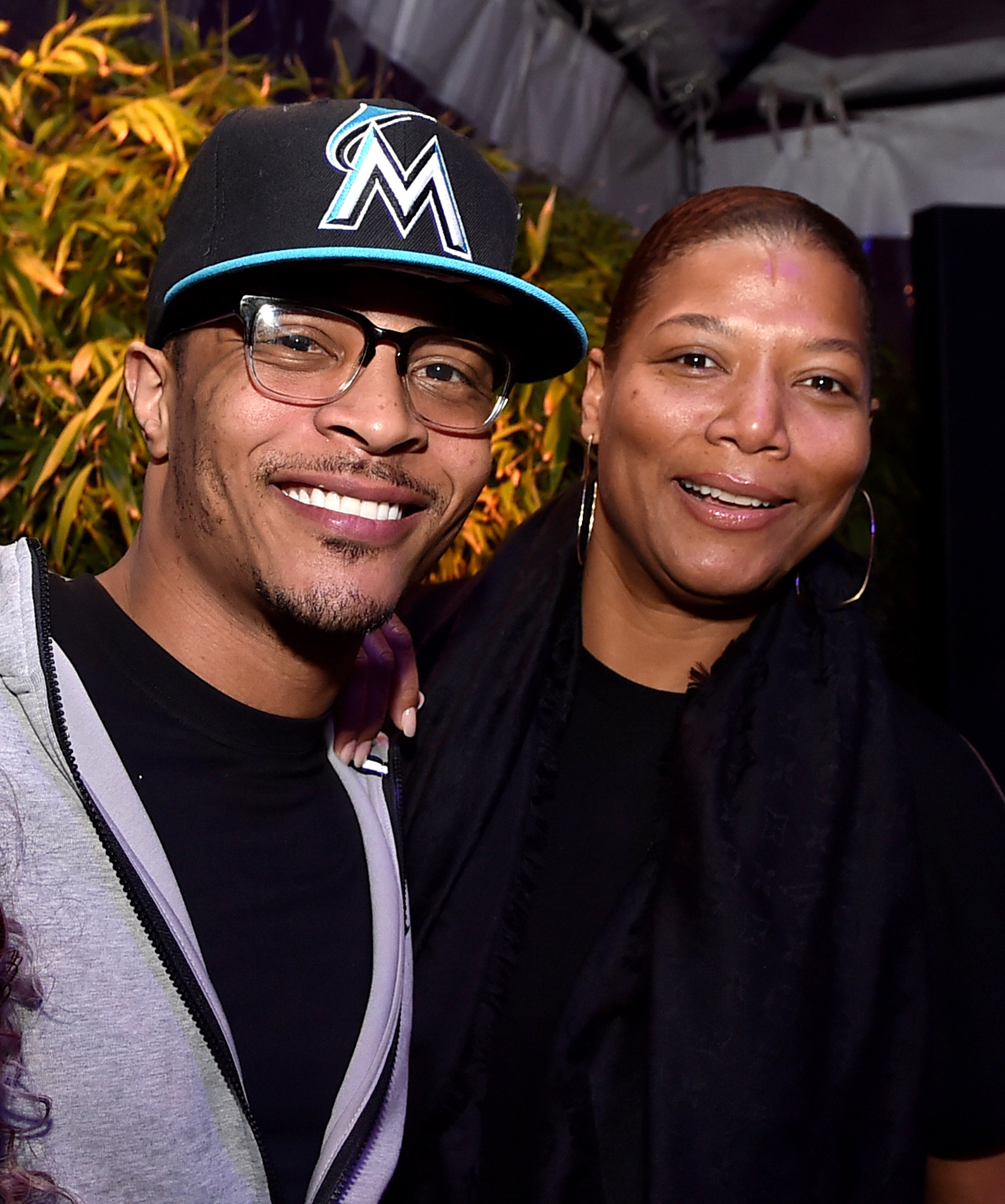 Queen Latifah and T.I. at event of Susikaupk (2015)
