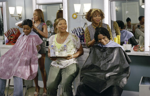 QUEEN LATIFAH (center), GOLDEN BROOKS (left-back), and ALFRE WOODARD (right-back) star as Gina, Chanel, and Ms. Josephine in MGM Pictures' comedy BEAUTY SHOP.