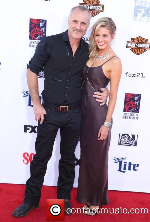 Timothy V Murphy and Caitlin Manley at the premiere of Sons of Anarchy.