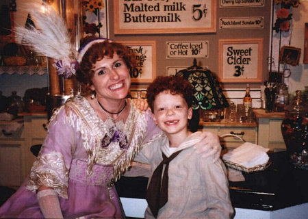 Cameron Monaghan (Winthrop Paroo) & Molly Shannon (Mrs. Shinn) in the candy store - The Music Man (2002)