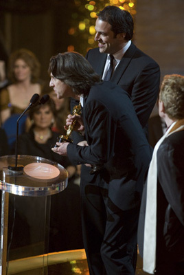 James Marsh and Simon Chinn accept the Oscar® for Best Documentary Feature for 