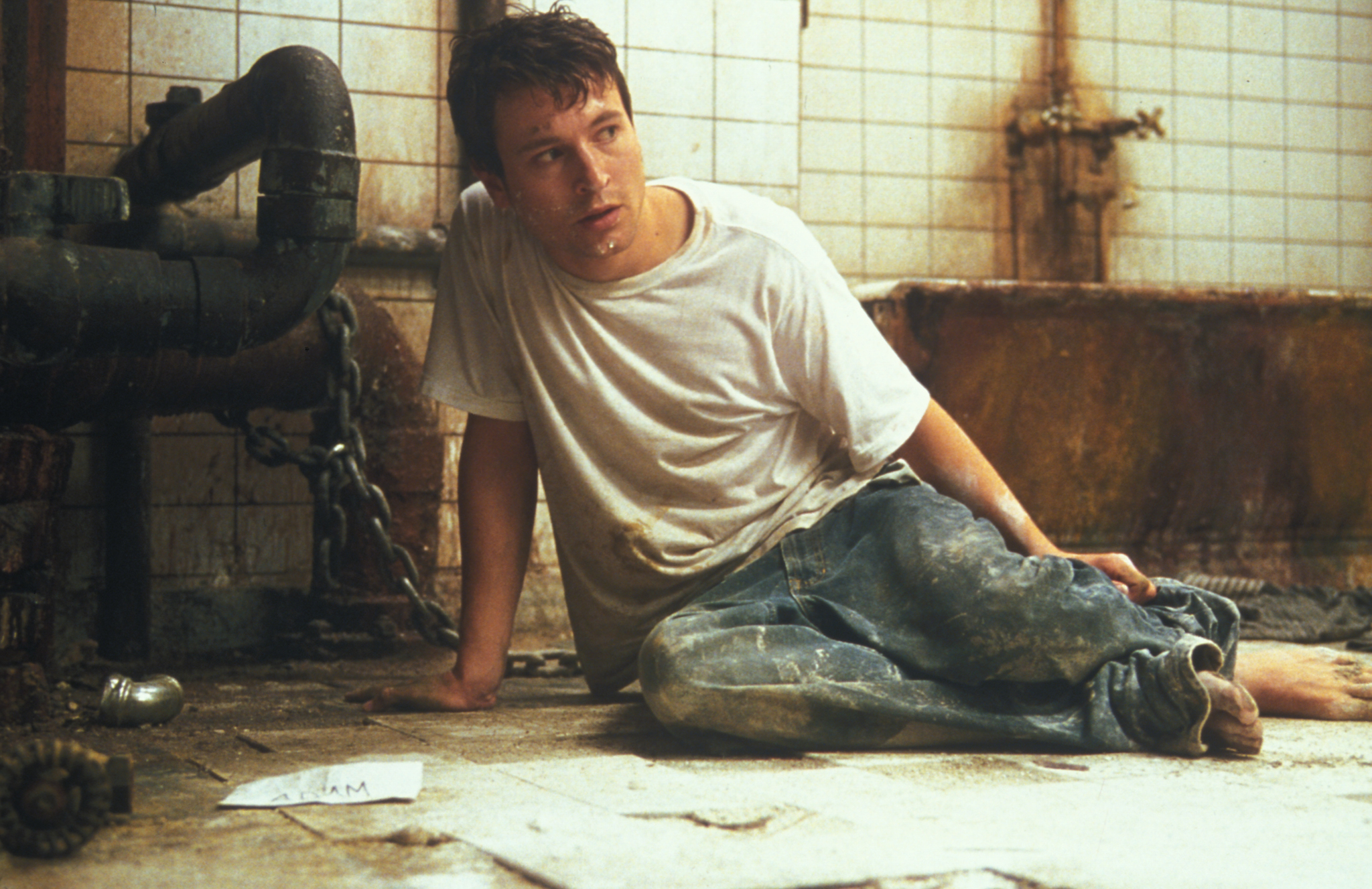 Still of Leigh Whannell in Saw (2004)