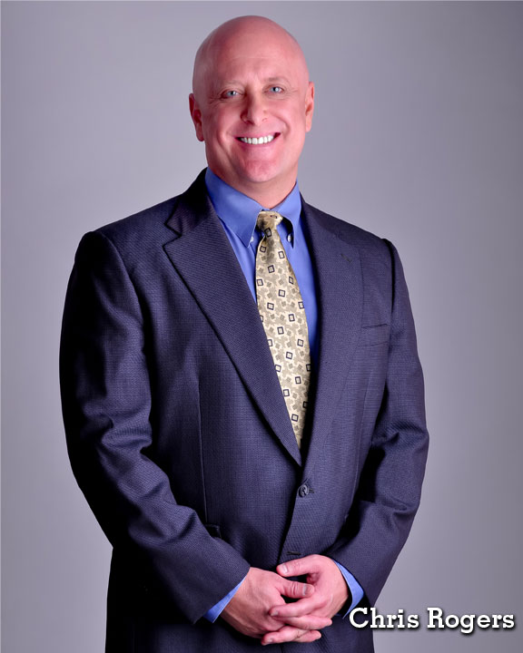 Chris Rogers, commercial headshot, no goatee', suit, vertical orientation