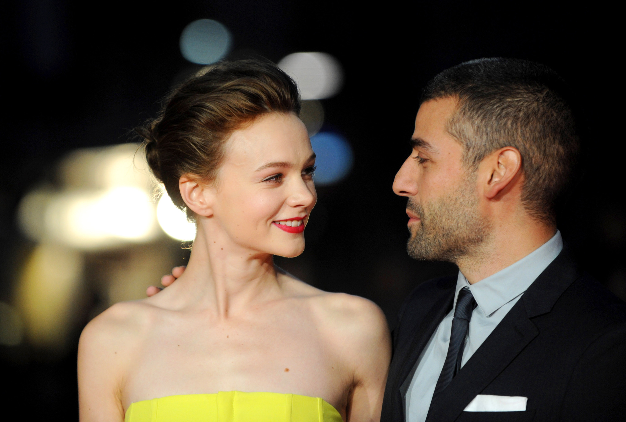 Oscar Isaac and Carey Mulligan at event of Groja Liuvinas Deivisas (2013)