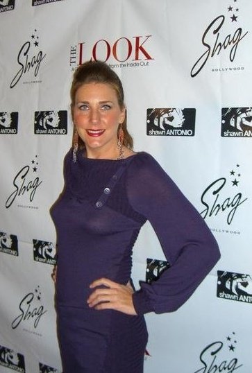 on the red carpet at the launch party of Randolph Duke's book, The Look.