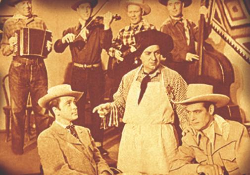 Still of Smiley Burnette, Paul Campbell, Charles Starrett and The Western Aces in Blazing Across the Pecos (1948)