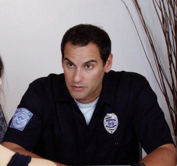 Gene Gabriel as Officer O'Hare in Chasing 8s
