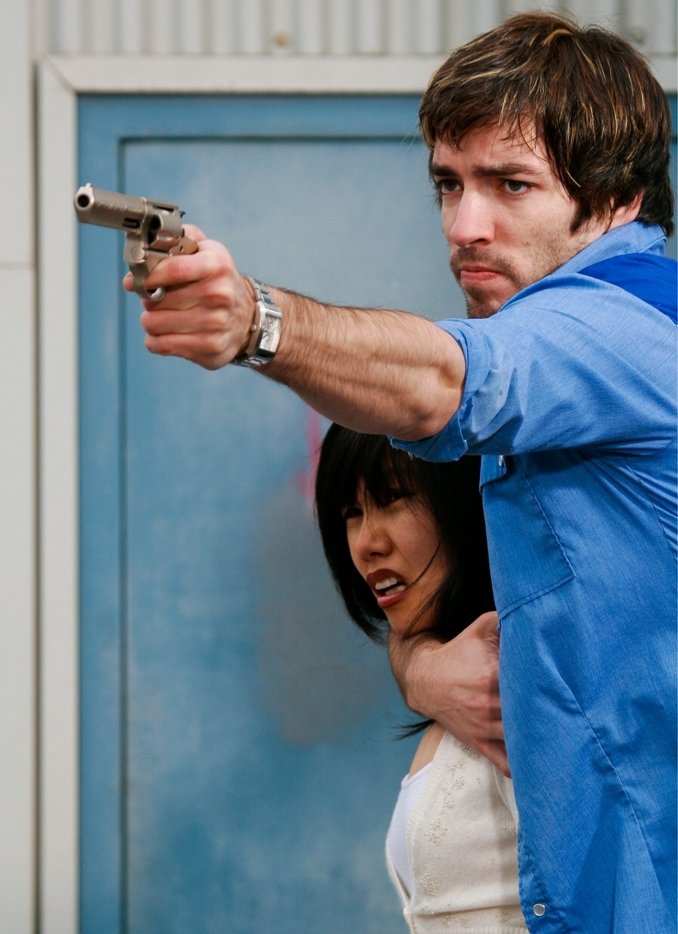 Production Still of Drew Scott and Aurora Chan in Versus