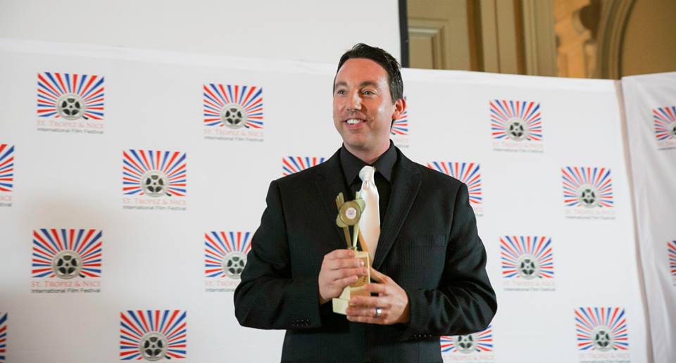 Mike Breyer accepting the Talented New Directors Award for Timothy Delaney at The St. Tropez International Film Festival for his short film Lock Box. May 2014.