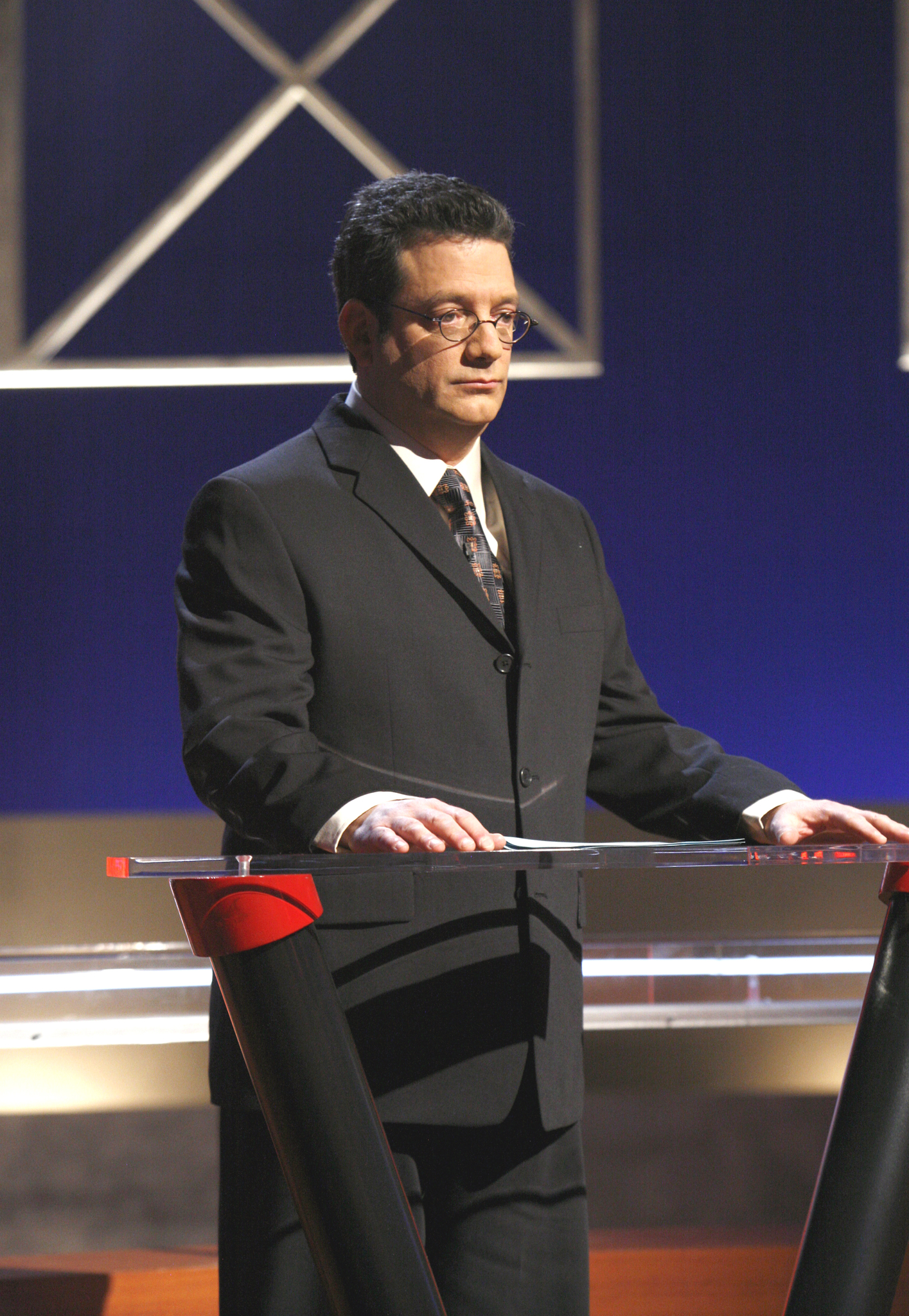 Still of Andy Kindler in Root of All Evil (2008)