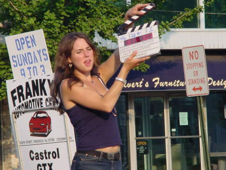 Melissa Howard (III) slates the last scene to be shot for Never Among Friends (2002)