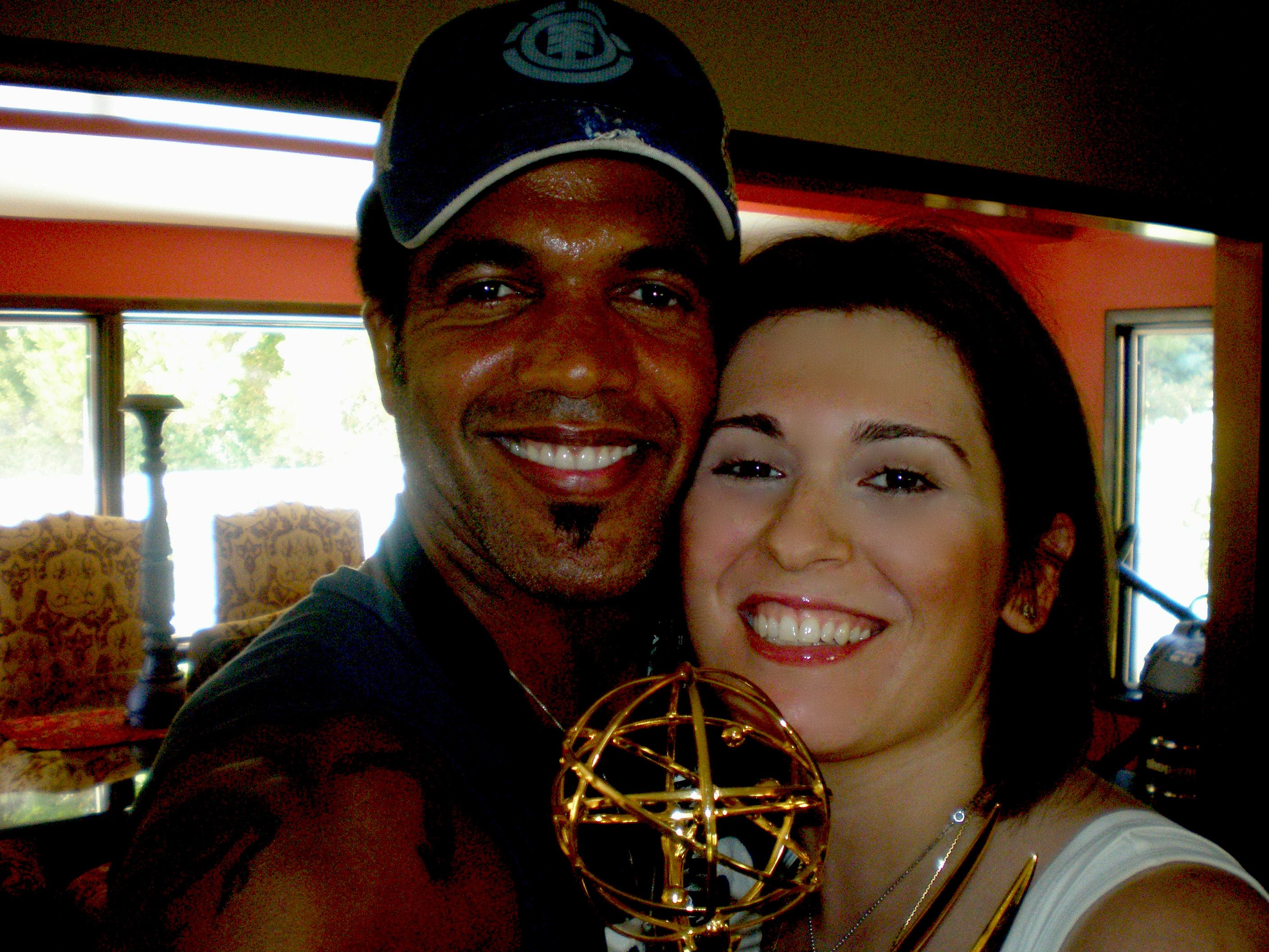 Farnaz Samiinia and Kristoff St. John holding his Emmy Award (