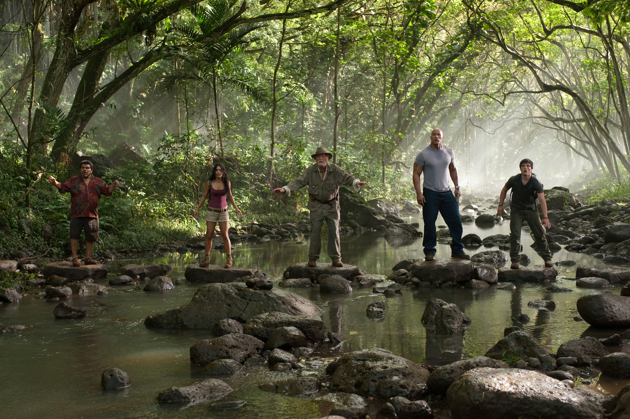 Still of Michael Caine, Luis Guzmán, Dwayne Johnson, Vanessa Hudgens and Josh Hutcherson in Kelione i paslaptingaja sala (2012)