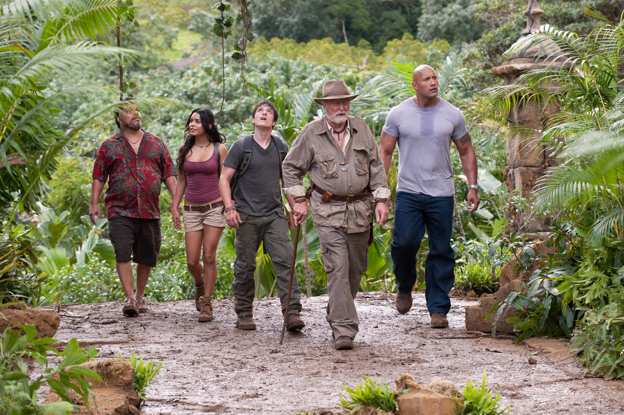 Still of Michael Caine, Luis Guzmán, Dwayne Johnson, Vanessa Hudgens and Josh Hutcherson in Kelione i paslaptingaja sala (2012)