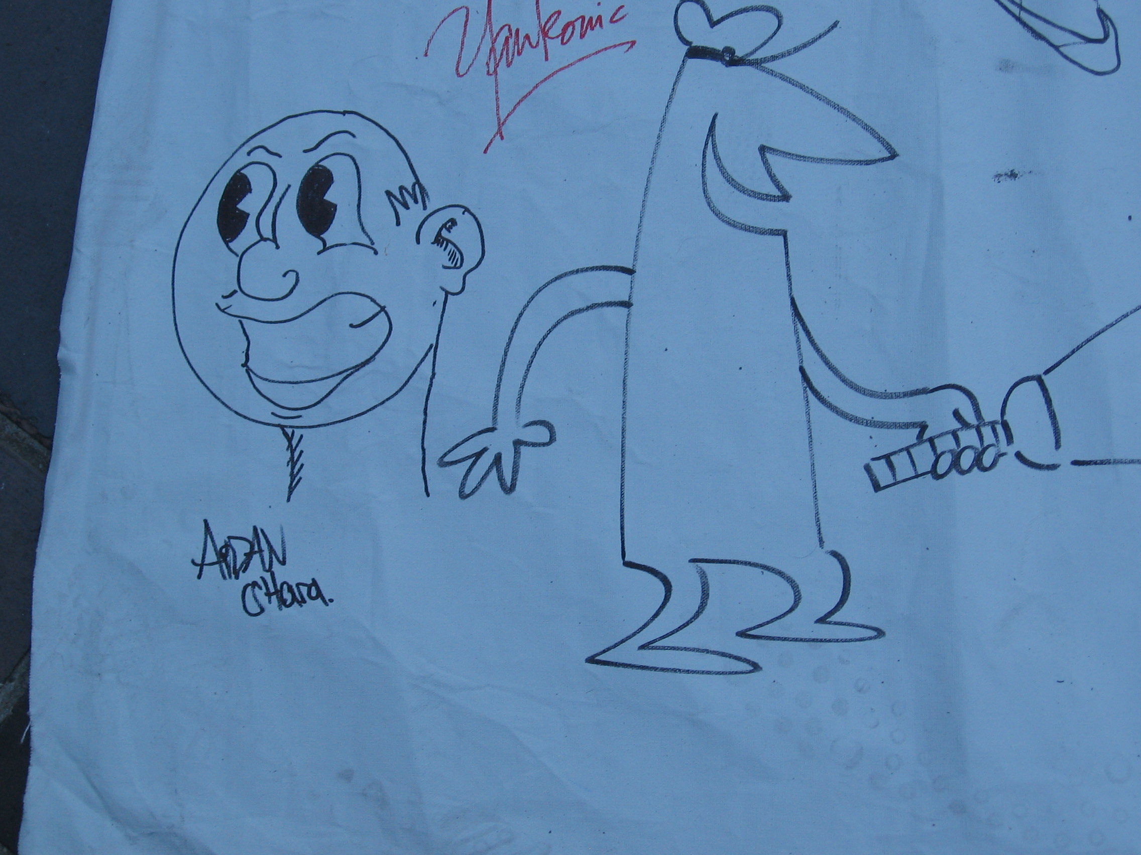 MR HAPPY character designer Aidan O'Hara is honored to be invited by Spike to tag Spike's classic Animation Graffiti Mural Photo taken at the 2006 Annecy Int Animation Film Festival
