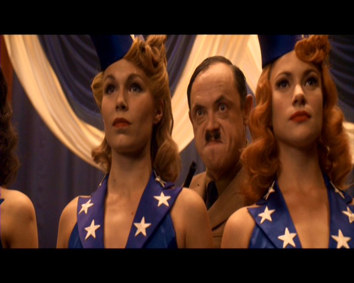 Hitler (James Payton) sneaks up on Captain America...it won't end well for ole Adolf.