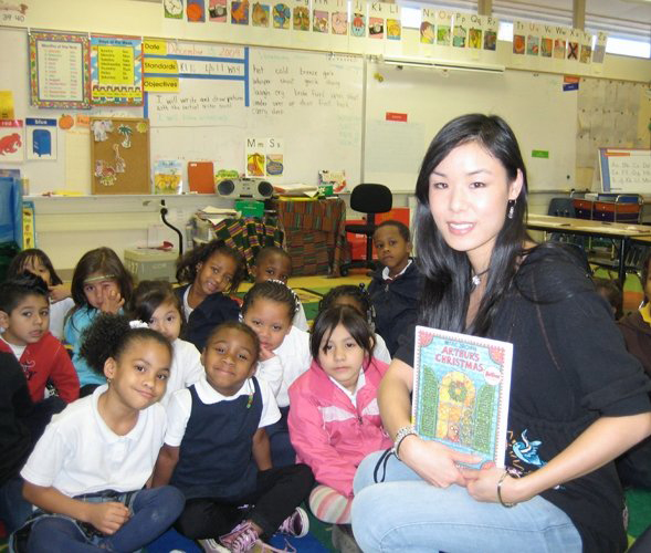 May Wang volunteering for Read Across America and Children Uniting Nations