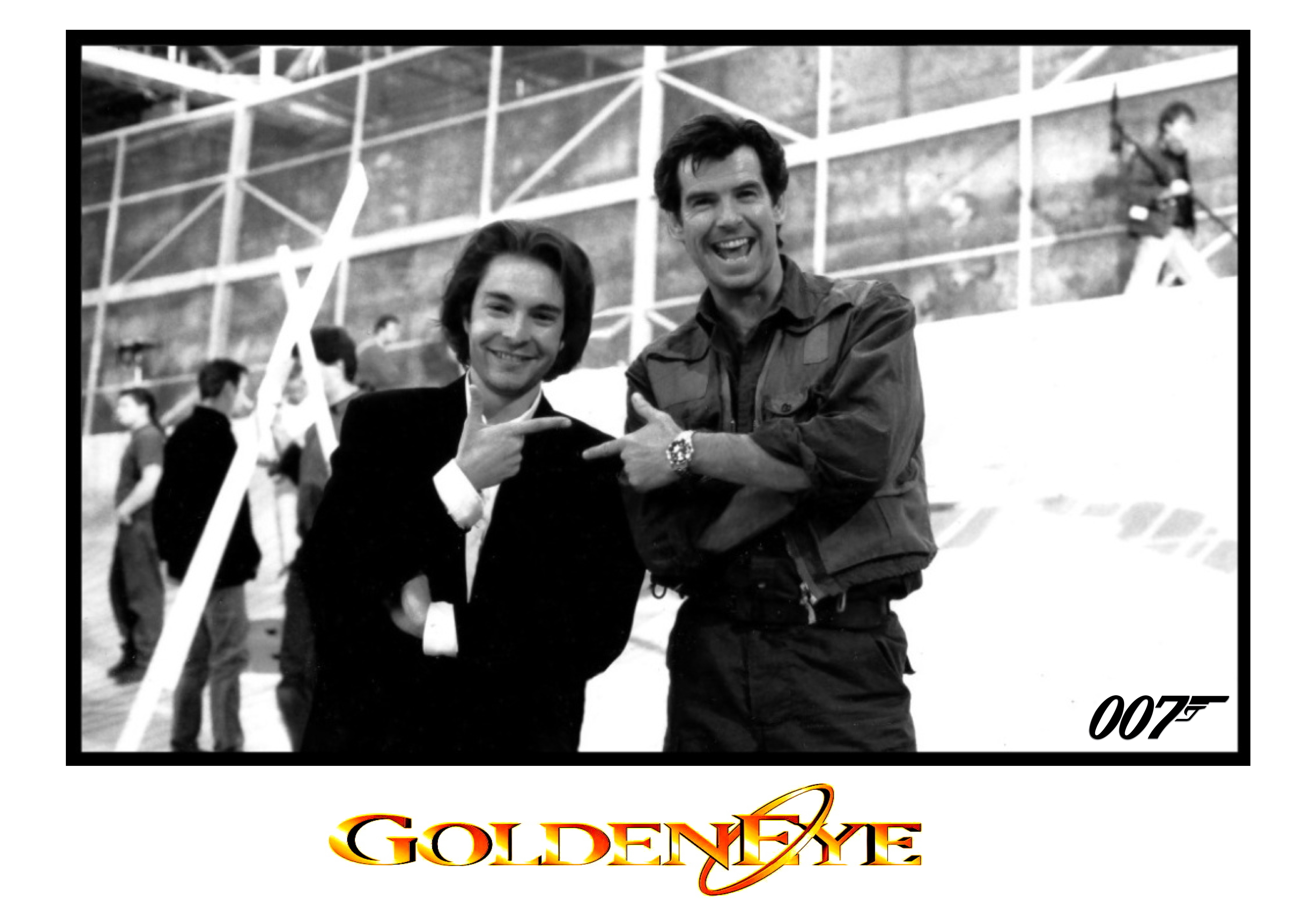 PIERCE BROSNAN and DAVID GIAMMARCO during filming of 
