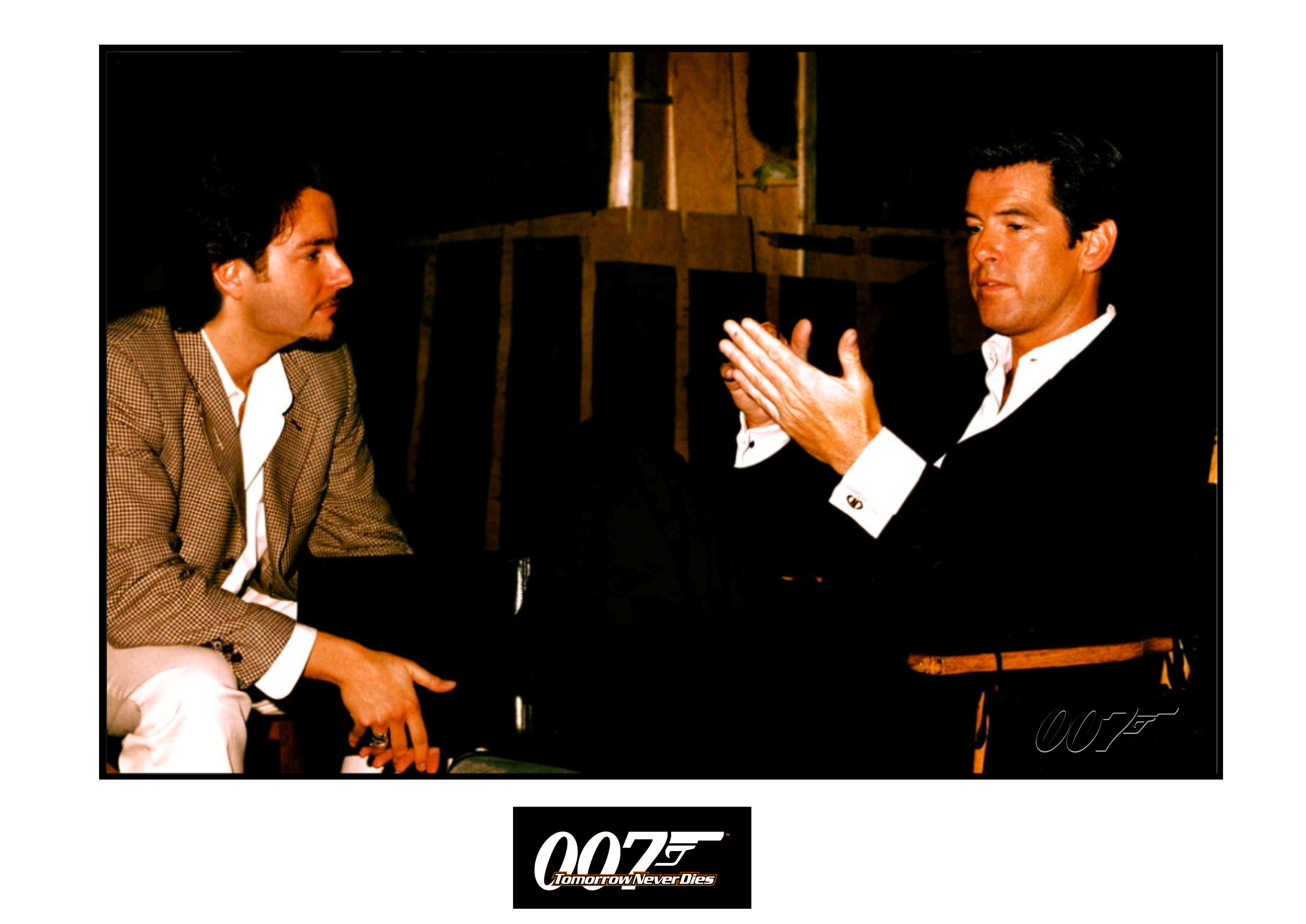 DAVID GIAMMARCO and PIERCE BROSNAN, during production of 