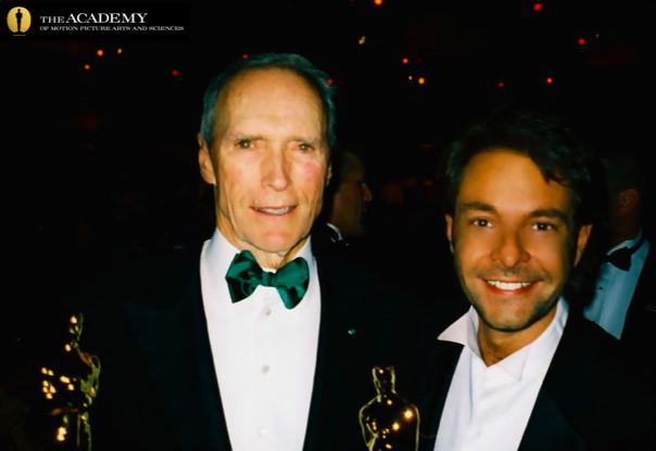 DAVID GIAMMARCO and CLINT EASTWOOD pictured holding the Best Picture and Best Director Oscars® at the Academy Awards Governor's Ball.
