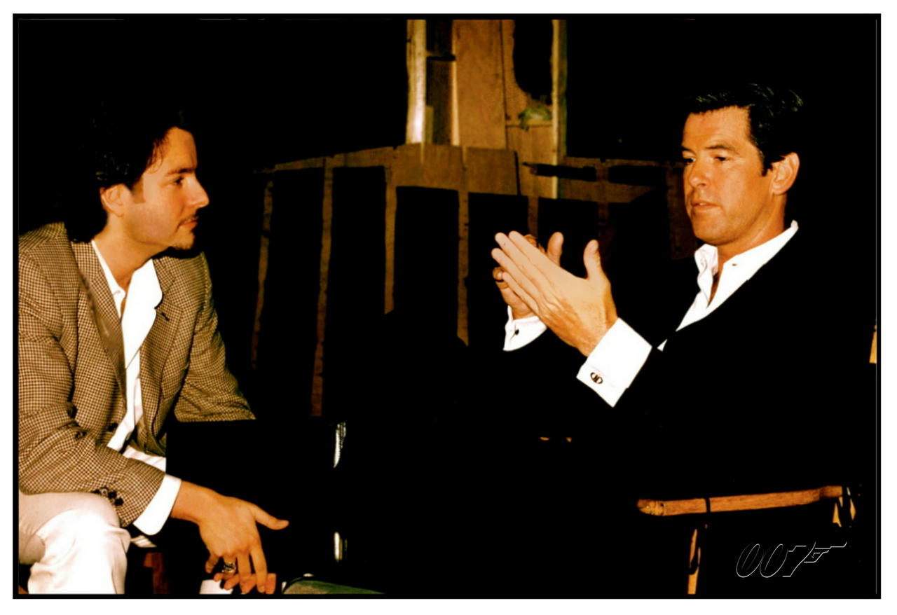 DAVID GIAMMARCO and PIERCE BROSNAN, during production of 