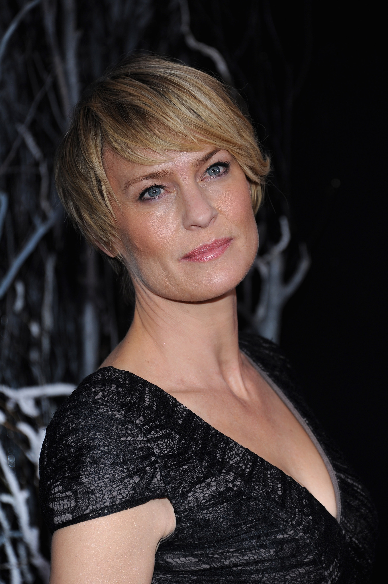 Robin Wright at event of Mergina su drakono tatuiruote (2011)