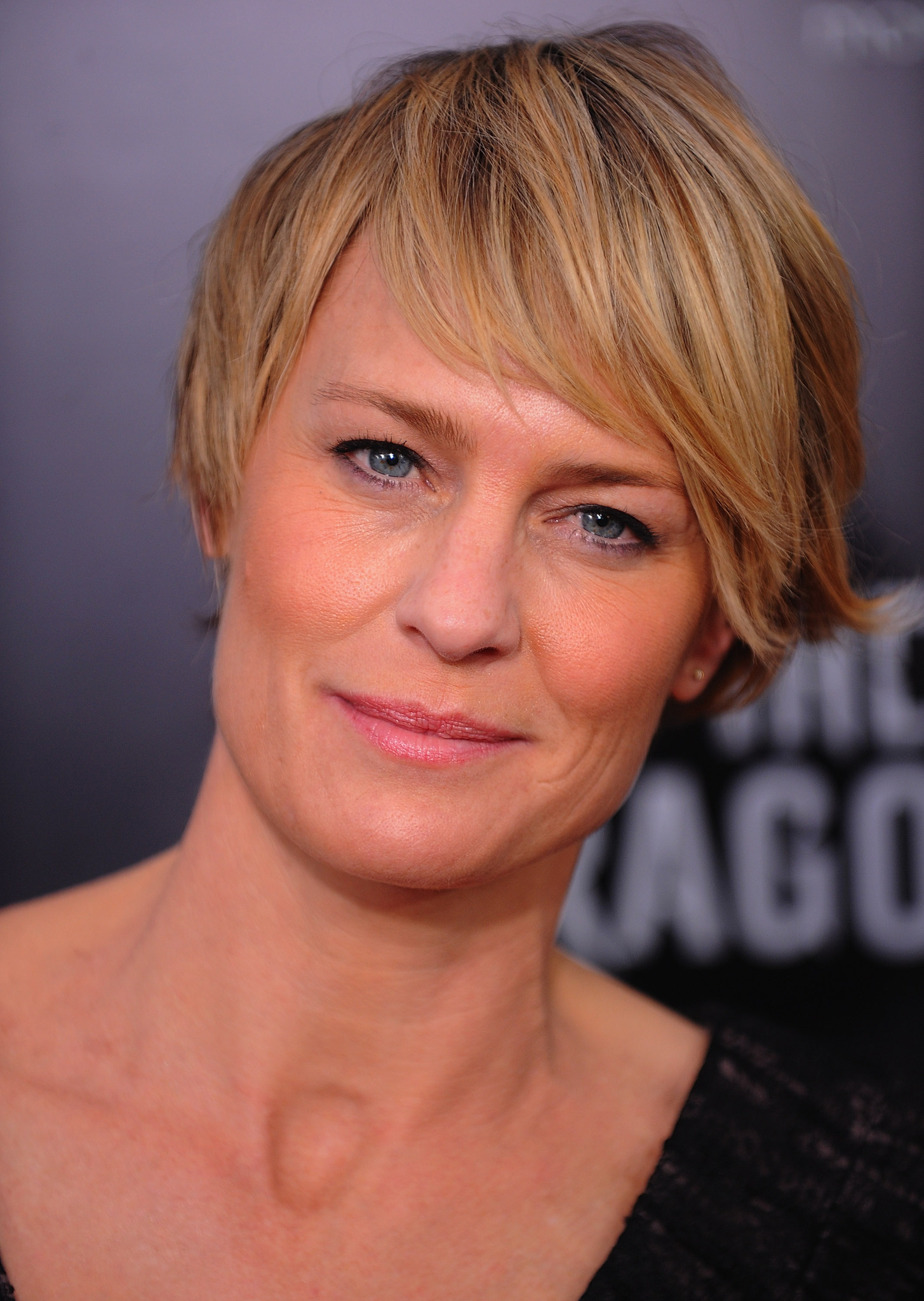 Robin Wright at event of Mergina su drakono tatuiruote (2011)