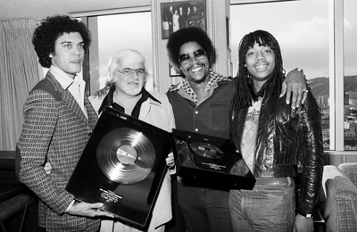 Rick James receiving his first gold album and single with Skip Miller, Barney Ales, Art Stewart, 1978