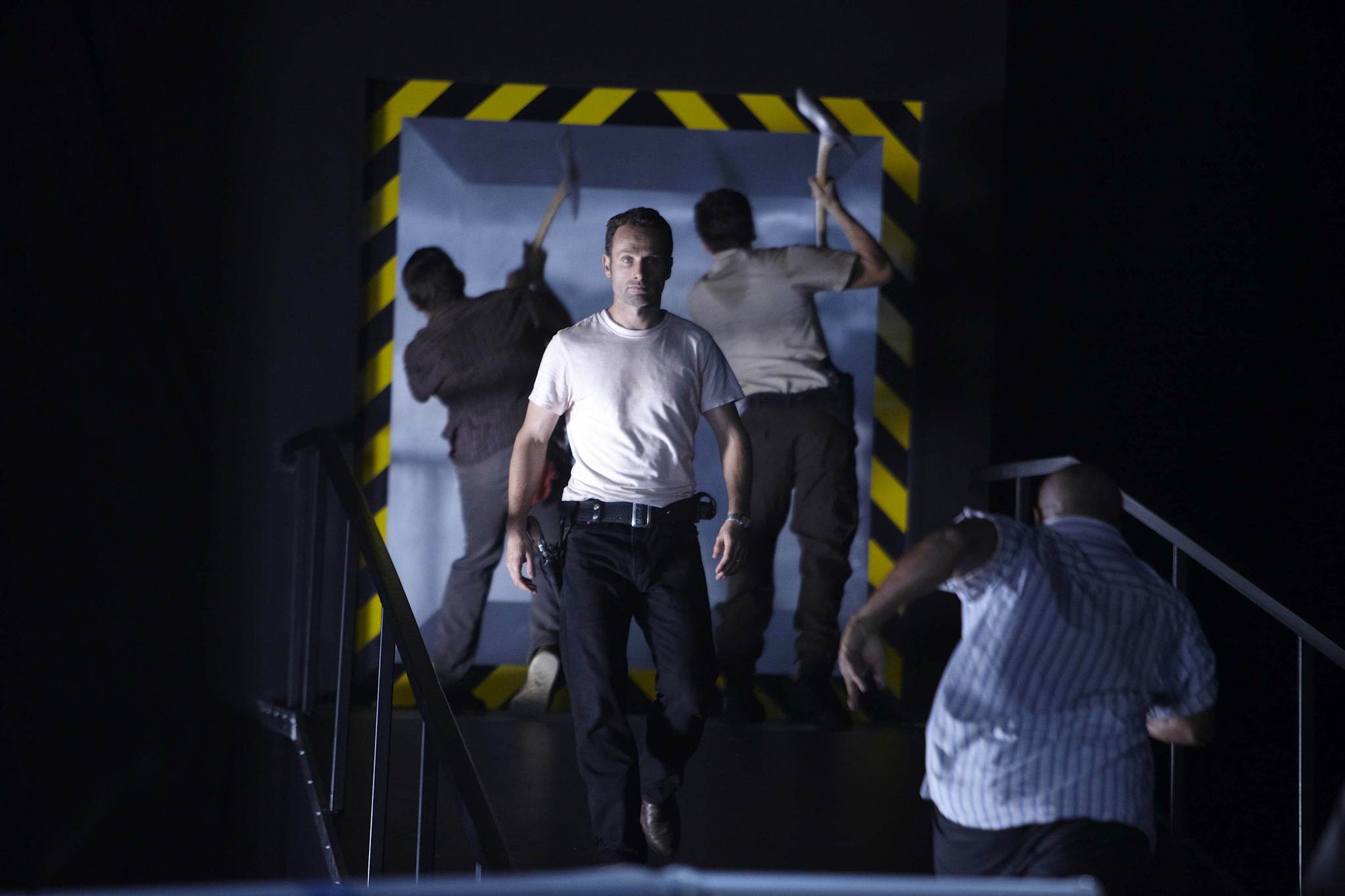 Still of Norman Reedus, Andrew Lincoln and Jon Bernthal in Vaiksciojantys negyveliai (2010)