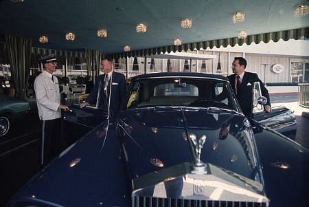 Conrad Hilton with his father Baron and their Rolls Royce C. 1978