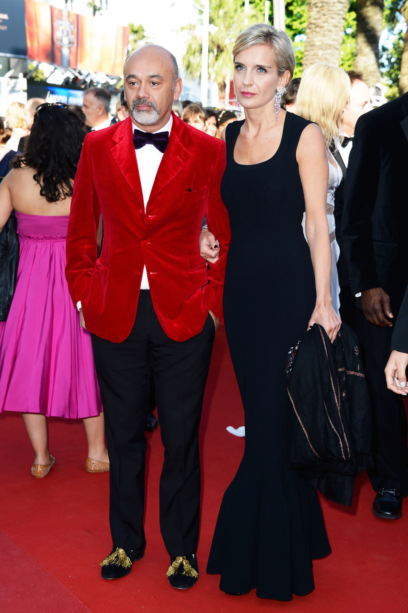 hristian Louboutin and Melita Toscan du Plantier attend the Premiere of 'Le Passe' (The Past) during The 66th Annual Cannes Film Festival at Palais des Festivals on May 17, 2013 in Cannes, France.