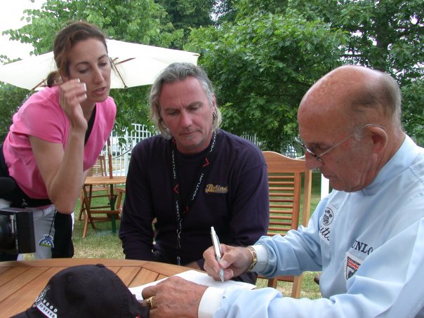 2005 Goodwood Festival of Speed, with Sir Stirling Moss as he signs his model release after we interviewed him.