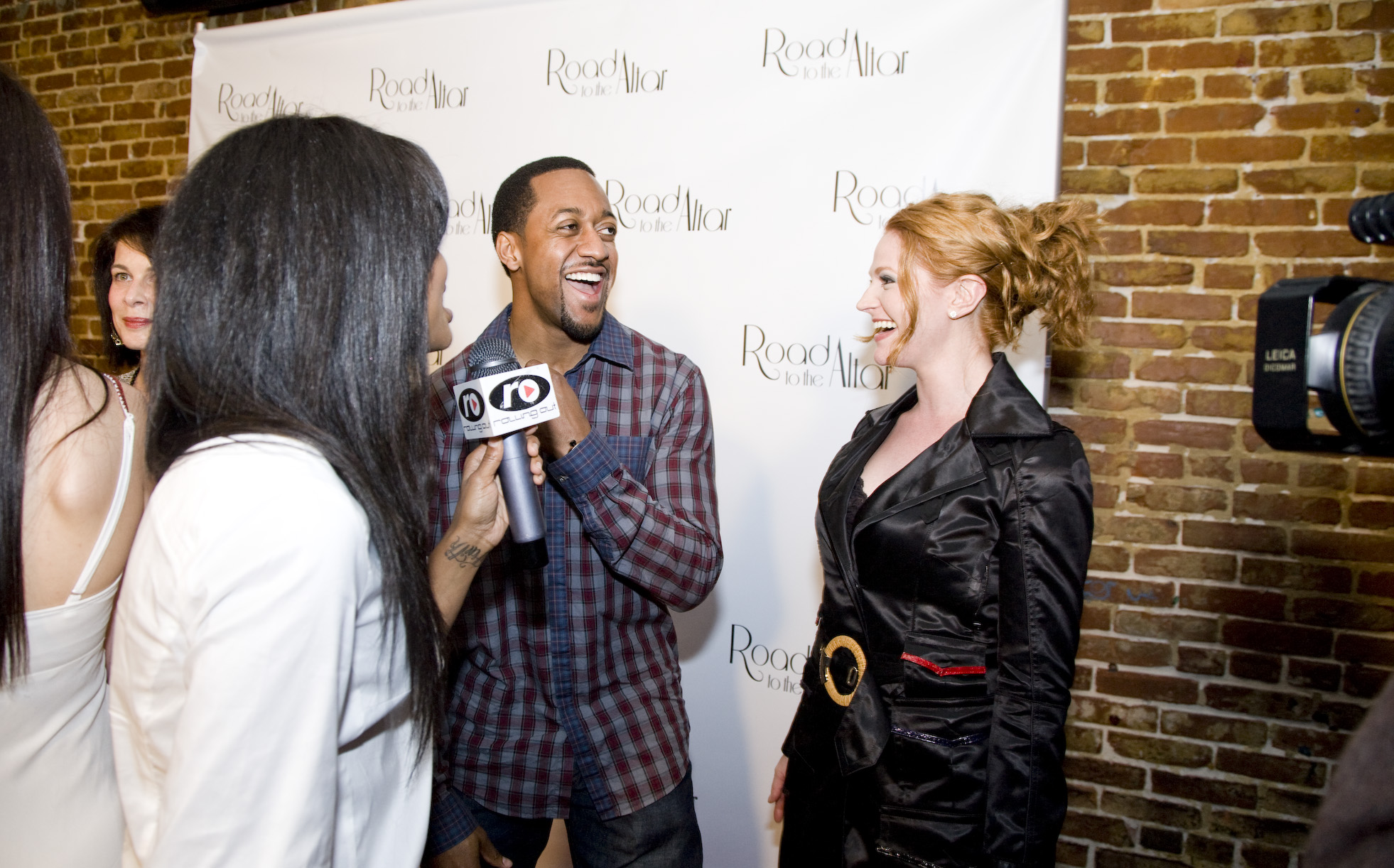 Jaleel White with Leyna Juliet Weber at the premiere of Road to the Altar