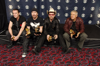 Bono, Adam Clayton, Larry Mullen Jr., The Edge and U2 at event of The 48th Annual Grammy Awards (2006)