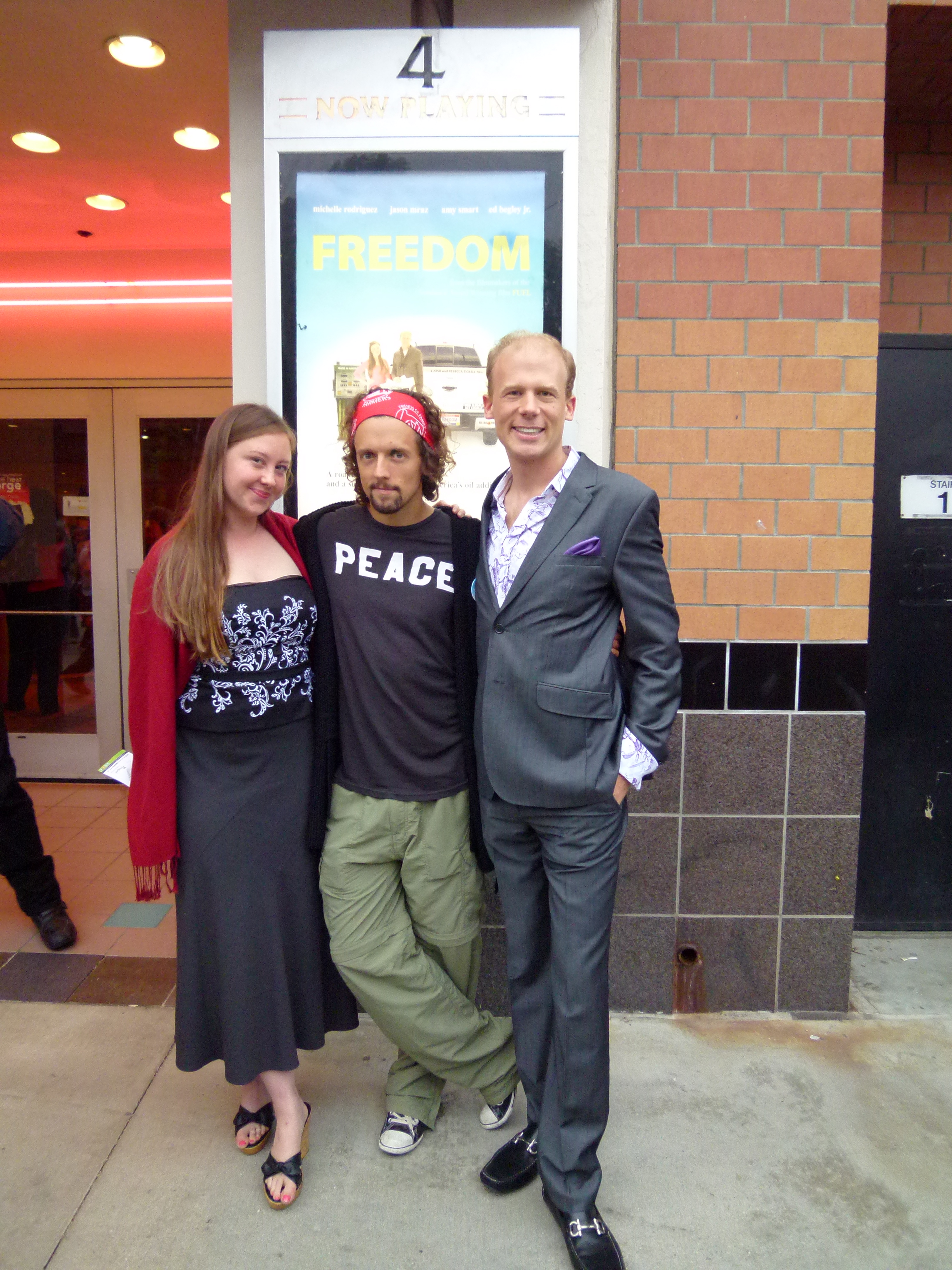 Josh and Rebecca Tickell with Jason Mraz at the opening of 