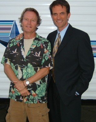 John Savage and Mel Fair on the set of 