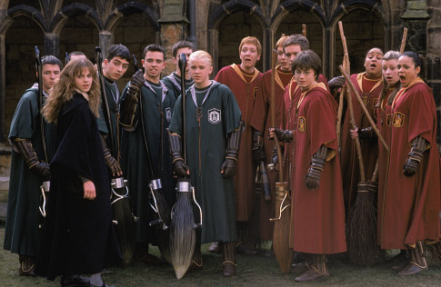 Hermione Granger (EMMA WATSON, left) joins the Quidditch players including Draco Malfoy (TOM FELTON, center) and Harry Potter (DANIEL RADCLIFFE).