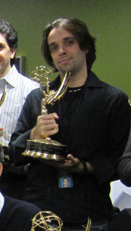 David receiving an Editing Emmy Award for 