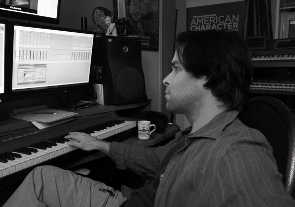 David working on a music cue