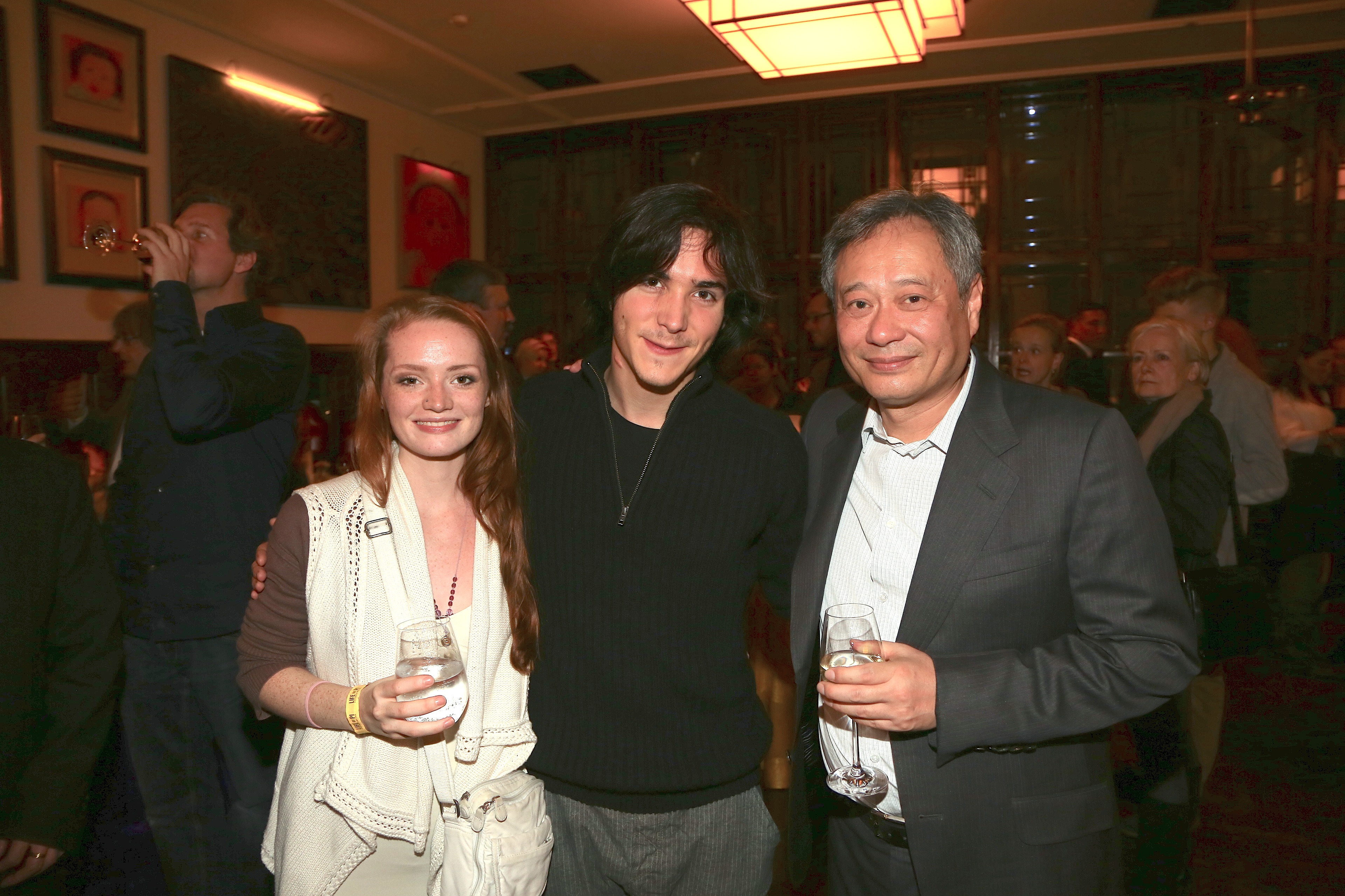 actors Janina Stopper and François Goeske with director Ang Lee at the premiere of 