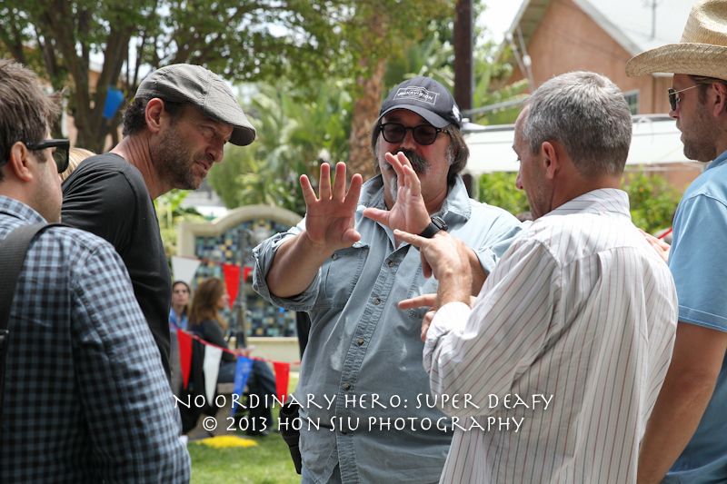 Troy Kotsur (Director with black t shirt) discuss with his DOP (Jeff Gatemans) through with interpreter,( James Foster) 2013