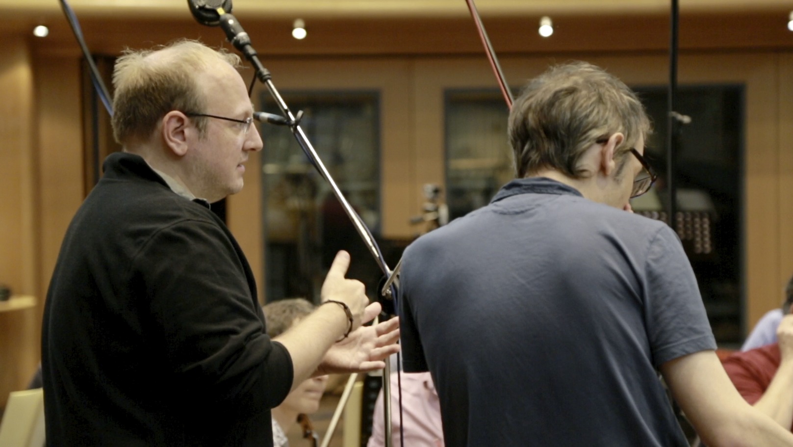 Composer Kerry Muzzey working with conductor Andrew Skeet and the Chamber Orchestra of London at AIR Studios, May 22, 2014
