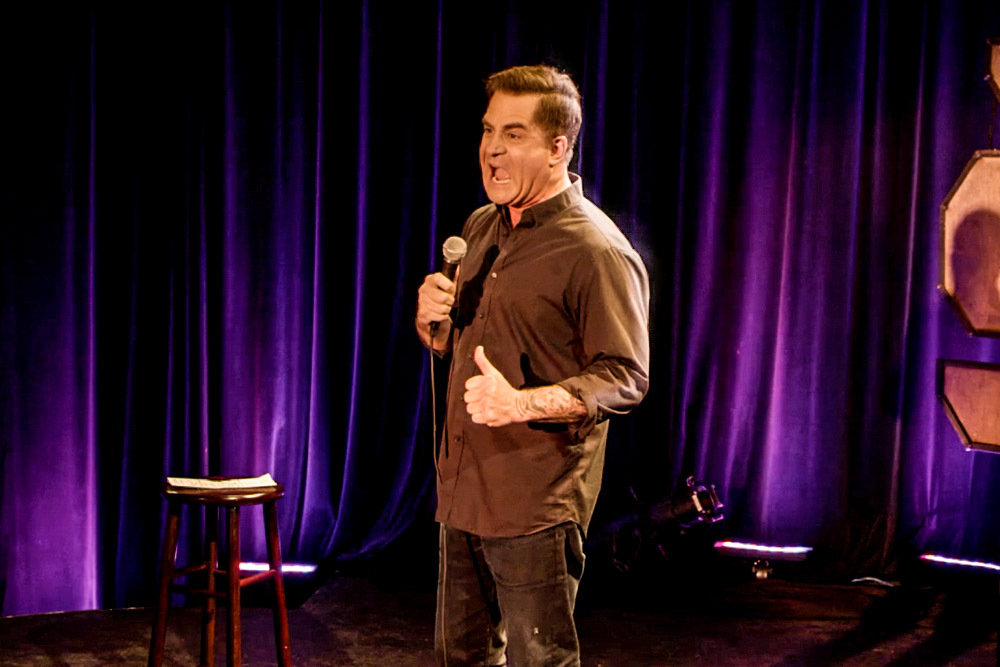 Todd Glass on stage at SXSW in 2015 for SXSW Comedy with W. Kamau Bell.